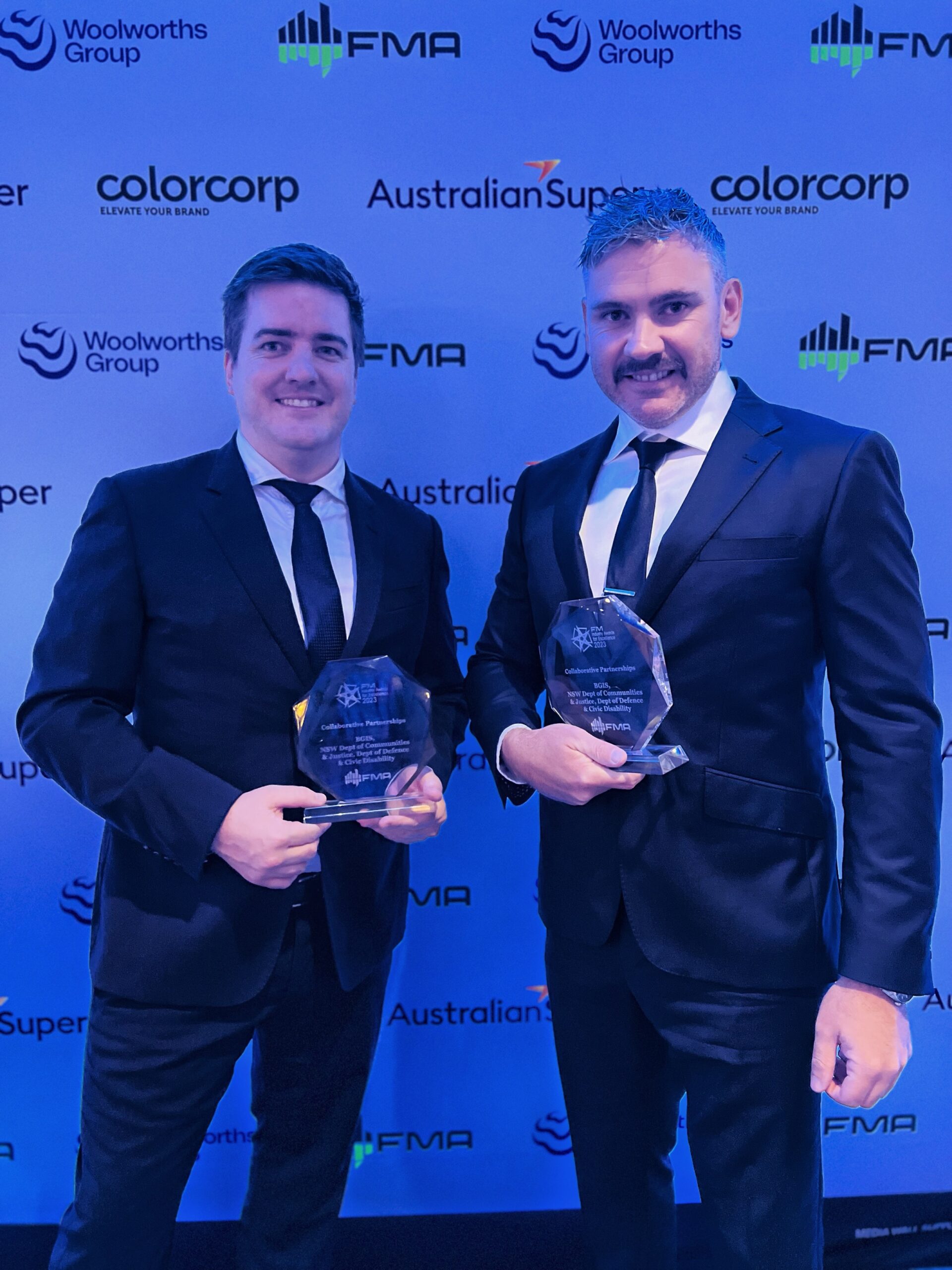 Tom Haszard, Director, Defence and James Donoghue, General Manager, Facilities and Service Management accepting the Collaborative Partnerships award at the Facility Management Association of Australia (FMA) Industry Awards for Excellence 2023.