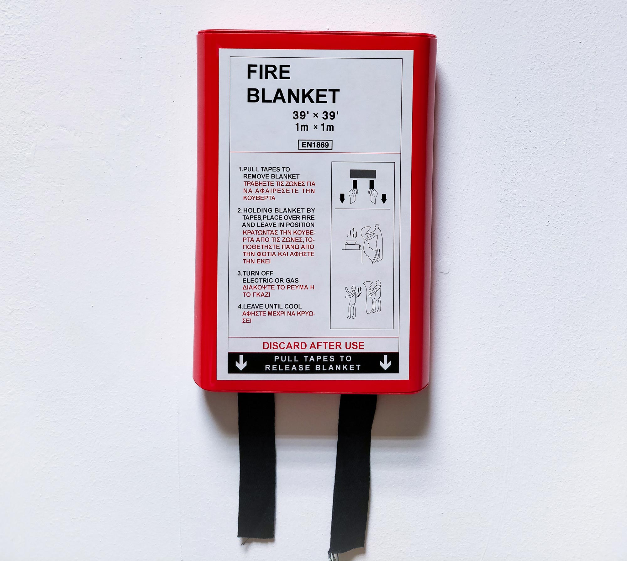 Fire blanket on a white wall