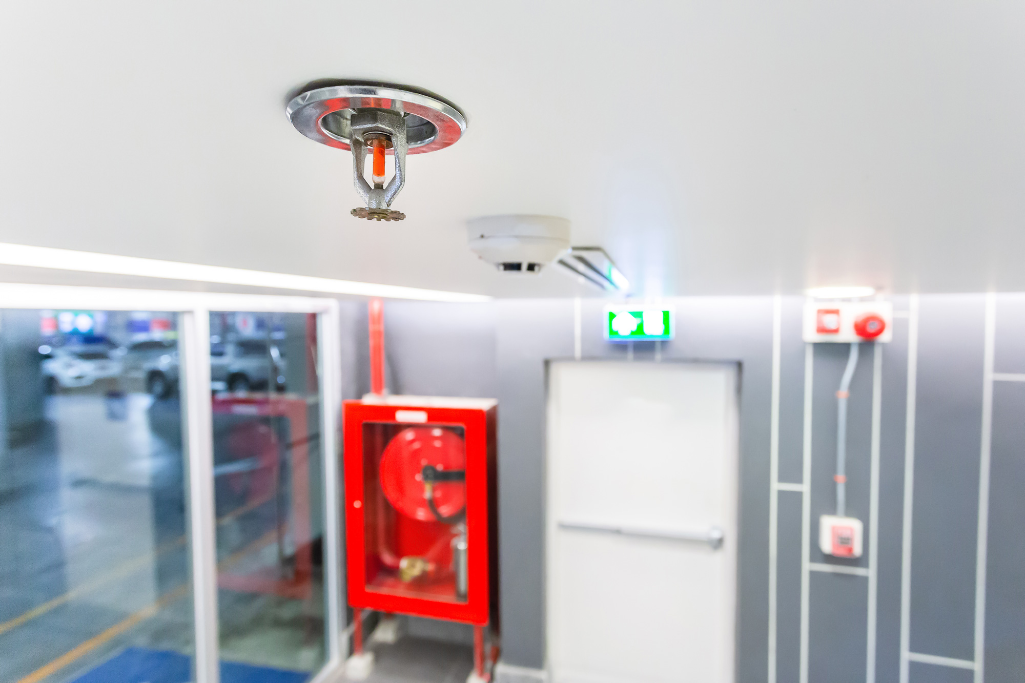 Fire Sprinkler, safety and to reduce damage in case of fire, signage exit